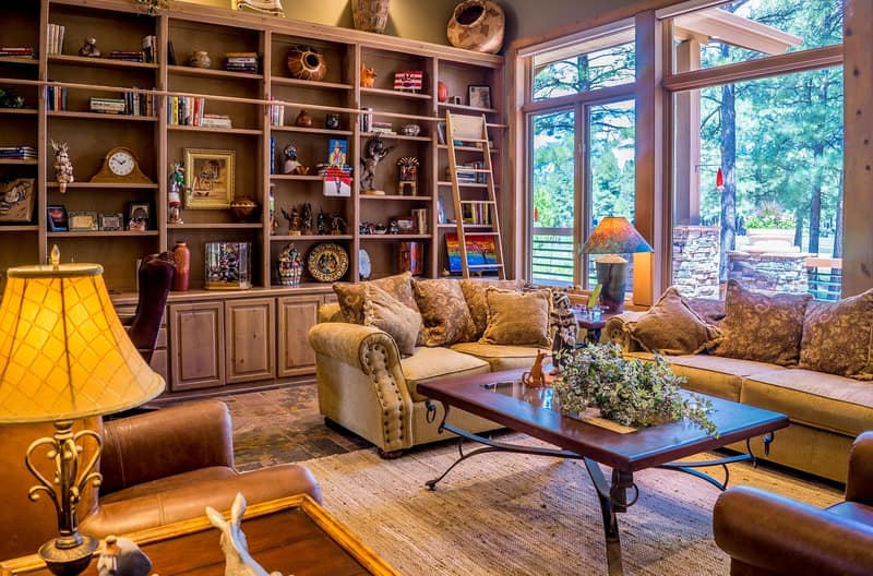 A warm living room with sofas arranged around a coffee table